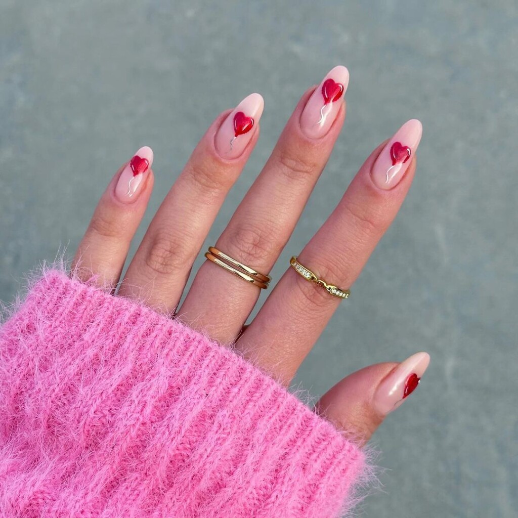 Valentine's Day Nail Ideas that inspire you pink base with heart balloons 
