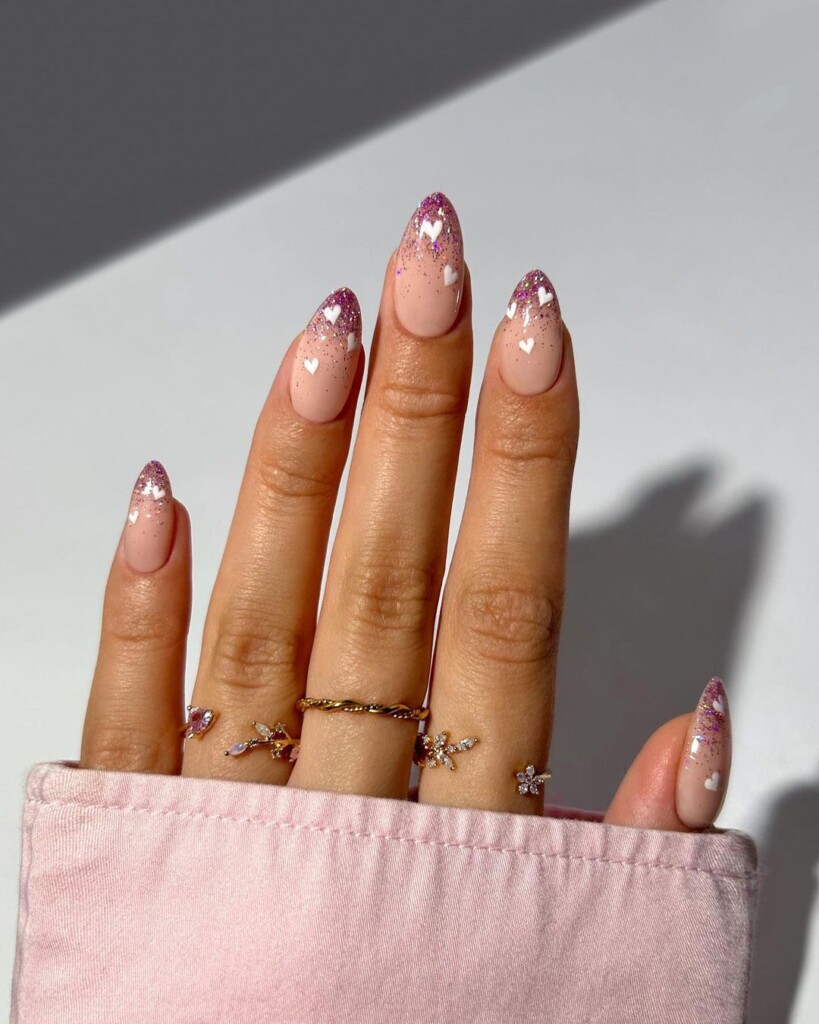 Nude base with ombre nails and small white hearts 