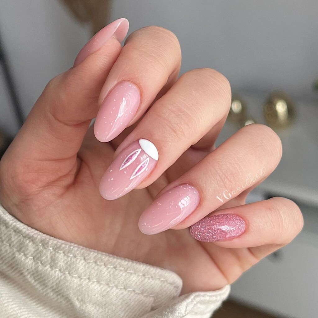 The best wearable Easter nail designs  nude and pink tones with bunny ears 