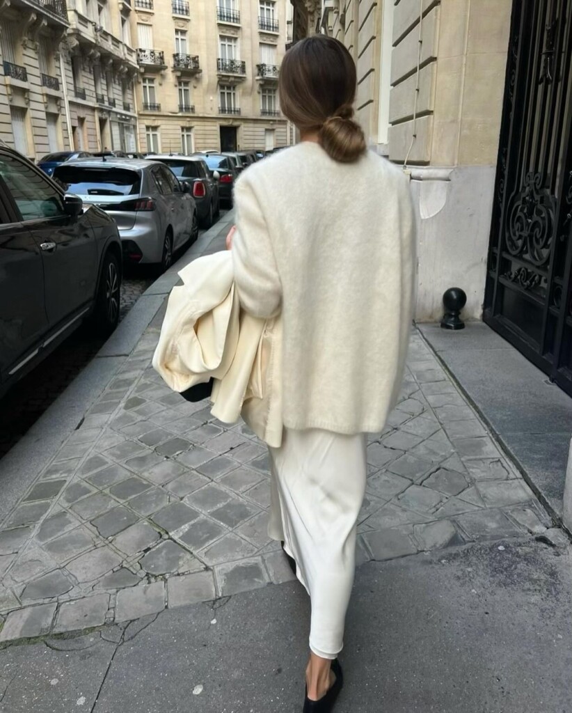 7 Casual Outfits to wear this week Lovisa Barkman wearing cream shic outfit of wool jumper and long skirt with hermes bag