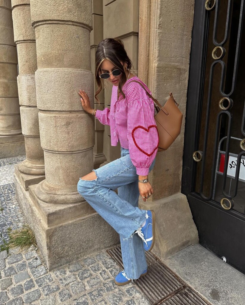 jeans, trainers and checked blouse with hearts on sleeves 