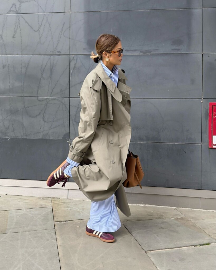 5 WEARABLE AUTUMN TRENDS 2024 outfit striped trousers, burgundy adidas and khaki trench 