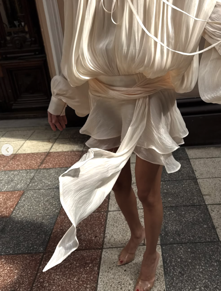 5 Timeless items you can wear all year long valera komarova wearing white floaty dress and clear mules