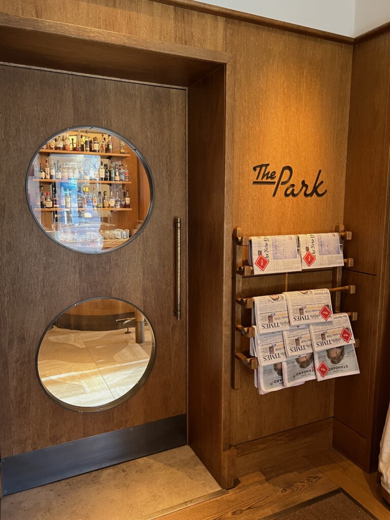 THE PARK LONDON REVIEW- CHIC GIRL'S BRUNCH The park reception area with chic newspaper holder 