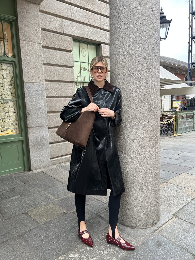 Eva McMahon wearing bared footwear shoes with patent coat and strathberry kite hobo bag classy autumn outfit idea for women over 40