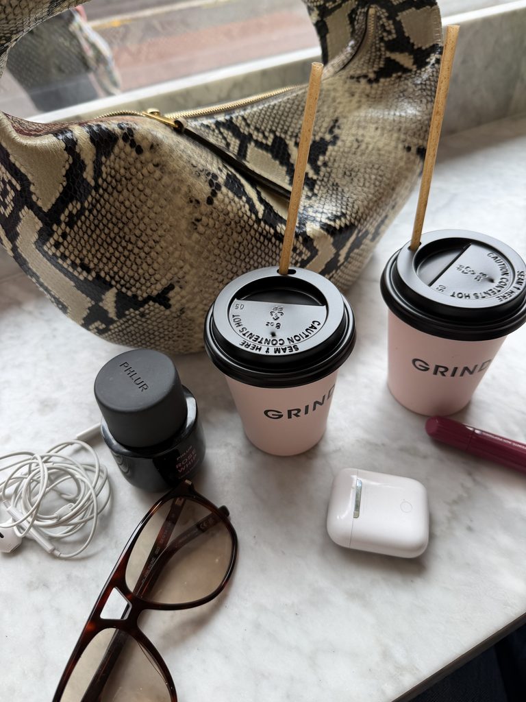 chic coffee shops in London picture of two grind takeaway coffees 